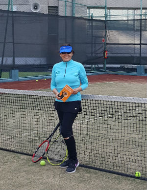 Sandra Orellana Tennis and Book