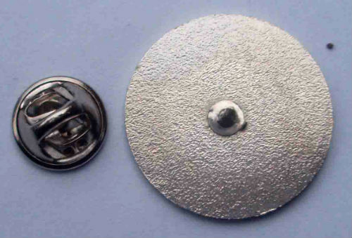 back of metal hand pin badge