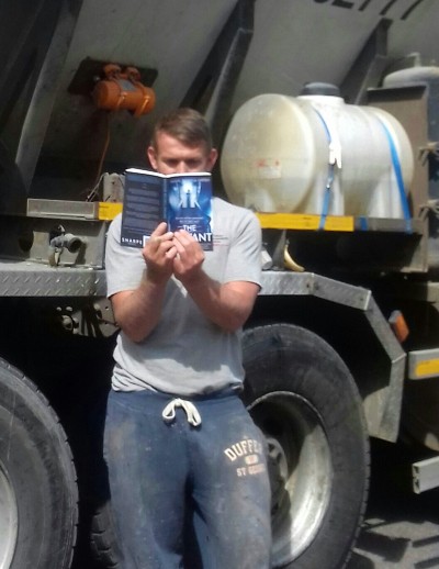 Workman Reading A Book